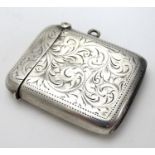 A silver vesta case with engraved decoration. Hallmarked Birmingham 1904 maker Joseph Gloster 2"