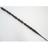 Ethnographic / Native / Tribal: A carved African hardwood ceremonial staff composed of four carved