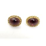 A pair of 9ct gold stud earrings set with garnet cabochon Approx 1/4" long Please Note - we do not