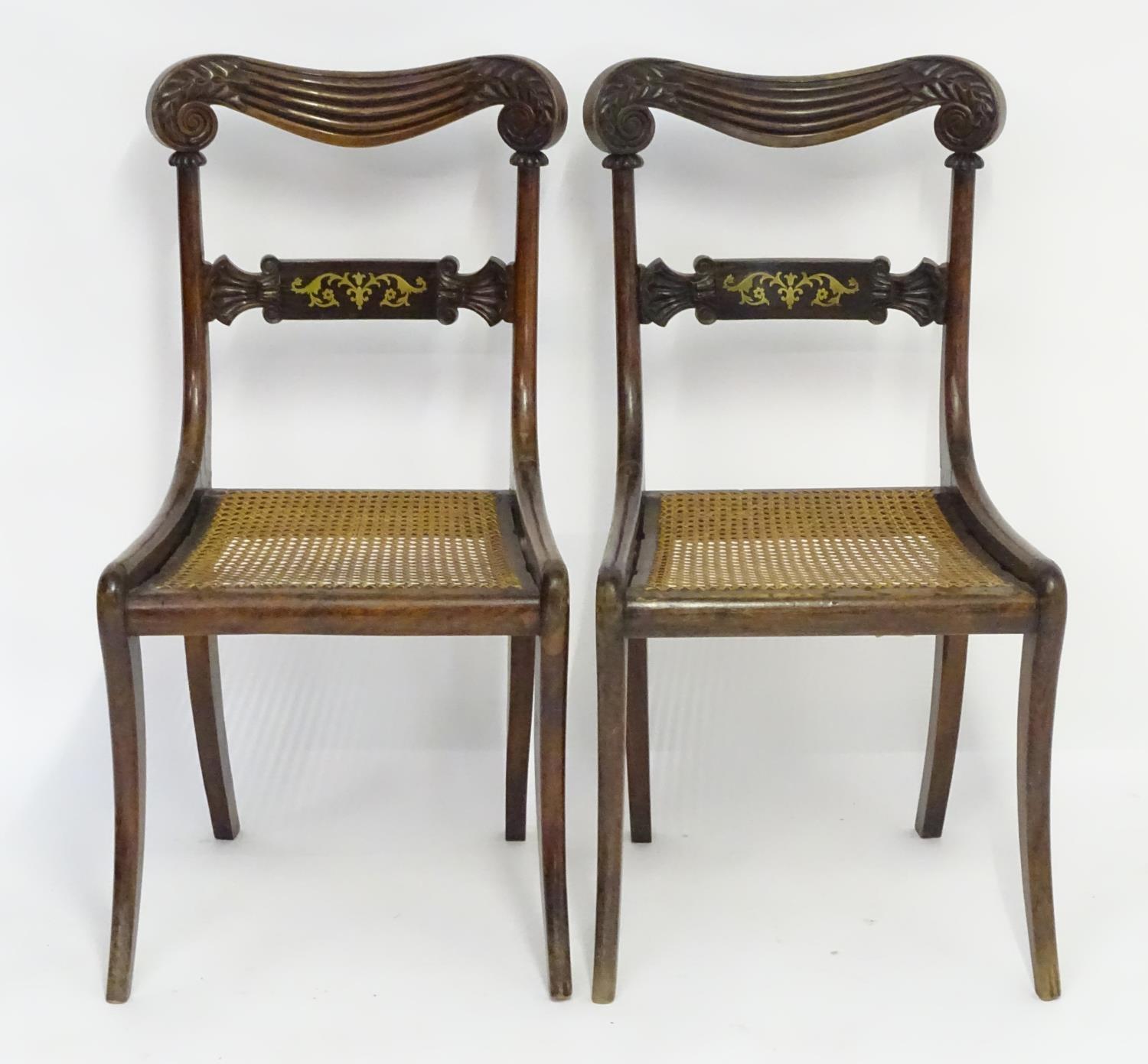 A pair of mahogany 19thC chairs with carved scrolled top rails above brass inlayed mid rails and - Image 3 of 7