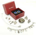 Assorted items including a silver bracelet, pendant etc a silver baby's rattle section titled '