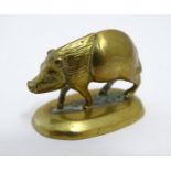 A 19thC brass model of a pig / boar. Approx. 1" high Please Note - we do not make reference to the