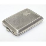 A silver match book / vesta case with basket weave engine turned decoration hallmarked Birmingham