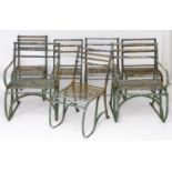 Seven Regency period garden chairs, these wrought iron strap back rails over a seat supported by 'S'