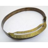 A Victorian brass hat measure / gauge of expanding form with scale to side. Please Note - we do