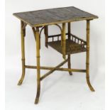 A late 19thC Meiji period side table with an rectangular top having a handmade embossed and gilt