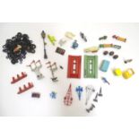 Toys: A quantity of die cast scale model spare parts and accessories to include wheels, tyres, two