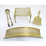 An assortment of Victorian brass fire / stove tools, comprising short tongs and shovel, trivet and