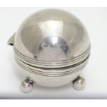 A novelty silver plate inkwell formed as a cricket ball 3" high Please Note - we do not make
