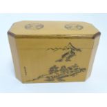 A Chinese blonde wood two sectional caddy decorated with a mountainous landscape scene, cherry