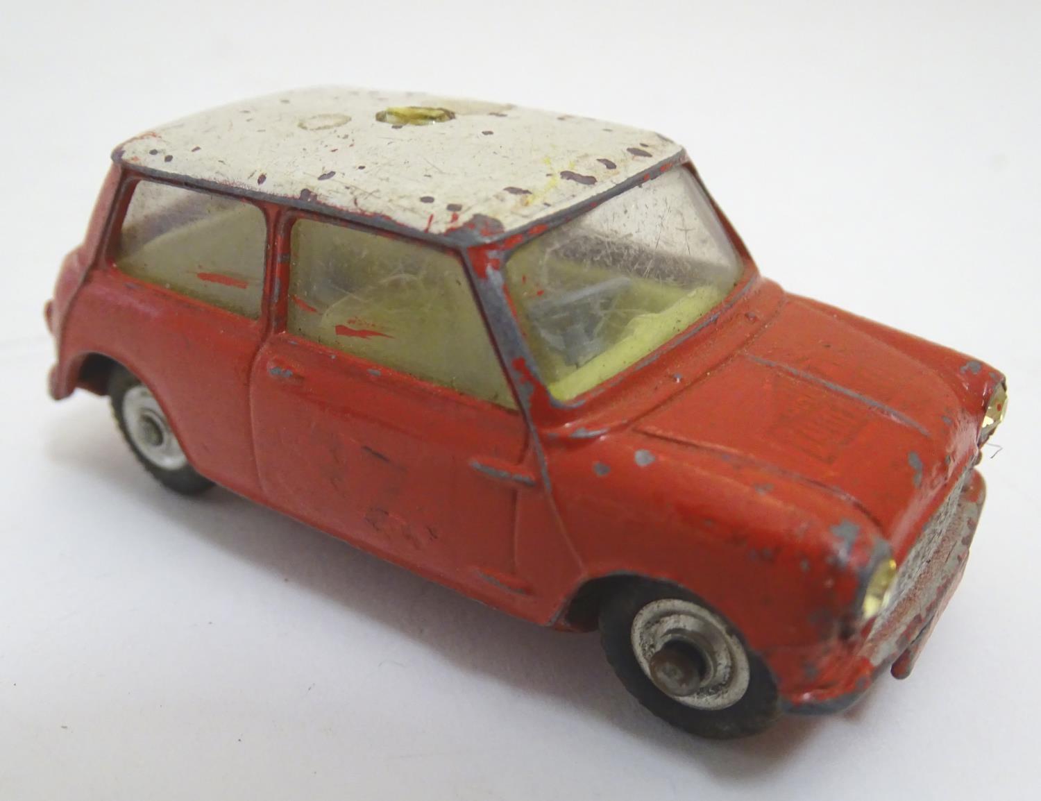 Toys: Four Corgi Toys die cast scale model cars comprising BMC Mini Cooper S with a blue body and - Image 7 of 9