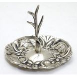 A silver ring tree with embossed scroll and angel decoration Hallmarked Birmingham 1905 maker Sydney