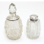A perfume / scent bottle with silver collar hallmarked London c1914 , together with a cut glass
