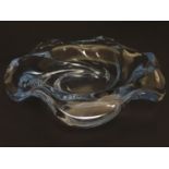 An c1940 Orrefors Edvin Ohrstrom centerpiece glass crystal bowl, formed as a swirl, signed under '