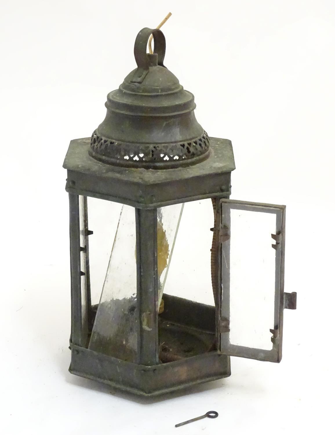 An Arts & Crafts copper hexagonal panelled pendant lantern, approximately 15 1/2" tall Please Note - - Image 4 of 5