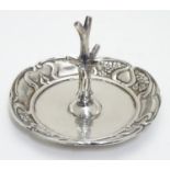 An Art nouveau silver ring tree with embossed decoration hallmarked Birmingham 1902 maker Henry