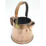 A large Victorian copper gallon milk can, with swing handle, 8 1/2" tall Please Note - we do not