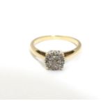 A 9ct gold ring set with a profusion of diamonds. Ring size approx. I Please Note - we do not make