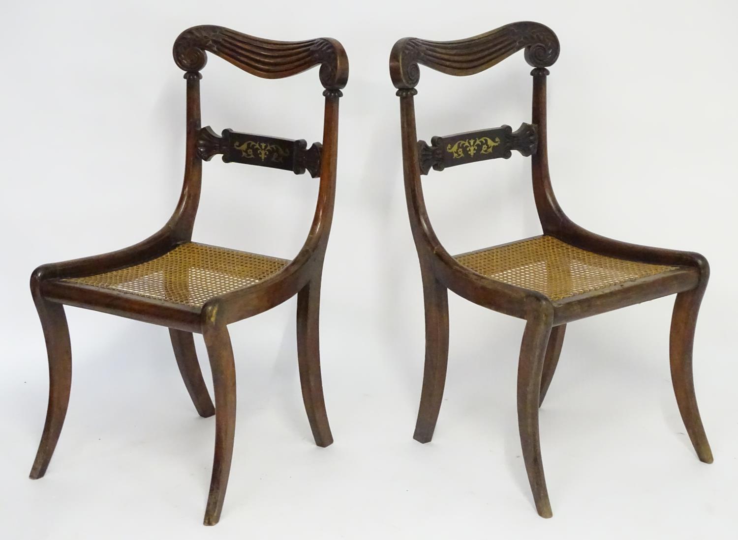 A pair of mahogany 19thC chairs with carved scrolled top rails above brass inlayed mid rails and - Image 5 of 7