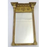 A 19thC pier mirror with lions mask motifs and beaded decoration. 17" wide x 26" high. Please Note -