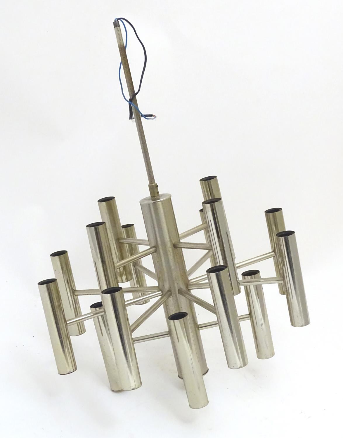 Vintage retro, mid-century: an Italian Gaetano Scolari pendant lamp, with sixteen lamps over three