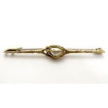 A yellow metal bar brooch set with central pearl 2" long Please Note - we do not make reference to