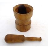 Kitchenalia: a continental 19thC Treen turned elm pestle and mortar, measuring 9 3/4" and 6 3/4"