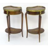 A pair of early 20thC side tables with pierced gilt surrounds and marquetry inlaid tops. The