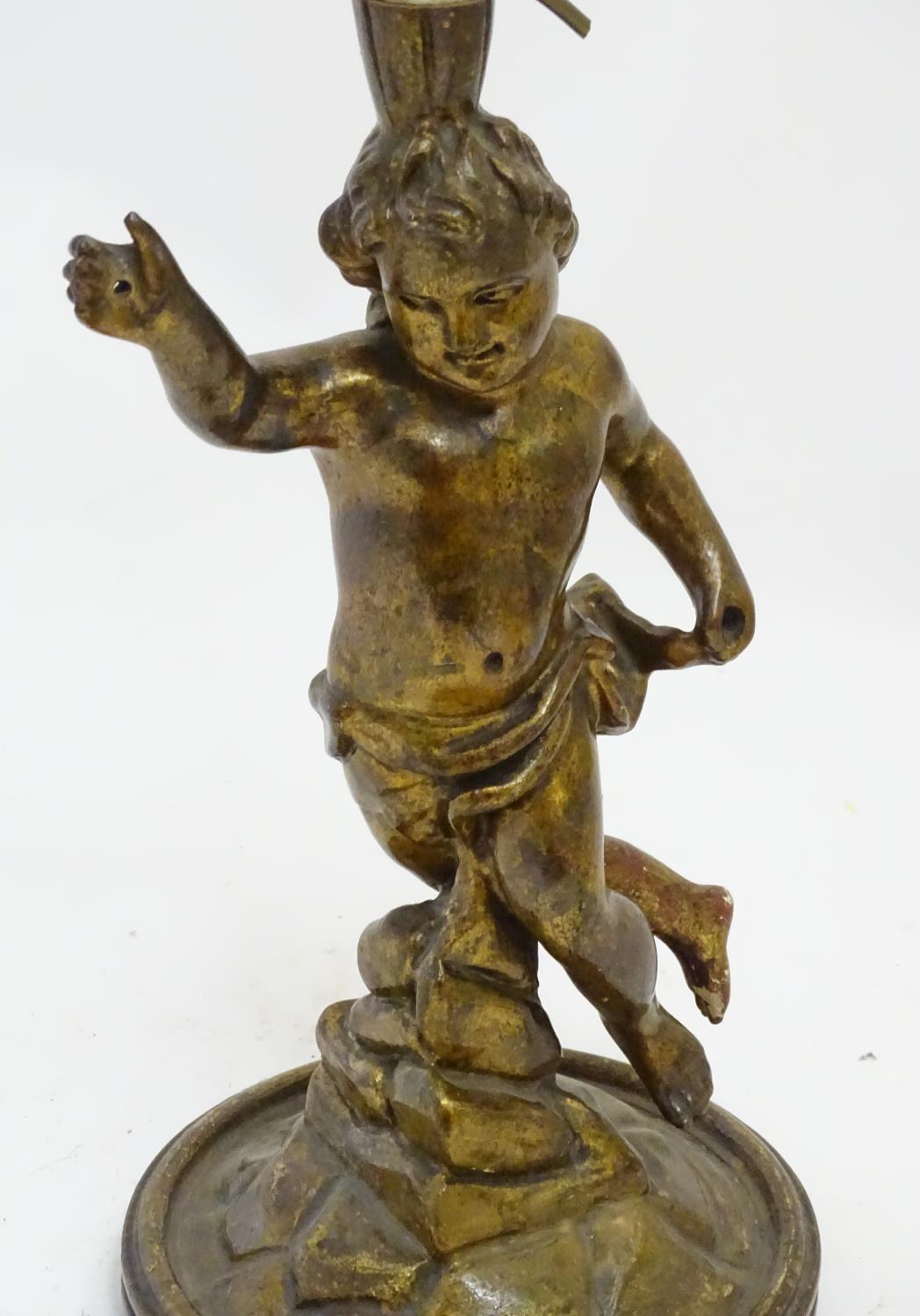 A 20thC Italian carved wooden lamp, formed as a putto with gilt finish and circular base, 21 1/4" - Image 5 of 5