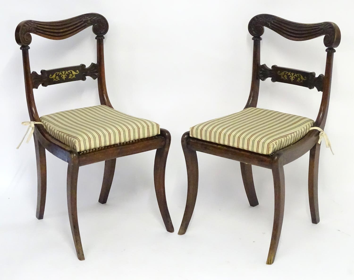 A pair of mahogany 19thC chairs with carved scrolled top rails above brass inlayed mid rails and - Image 2 of 7