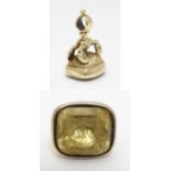 A Victorian gold and gilt metal pendant fob seal, set with citrine seal under engraved with motto '