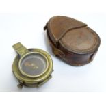 A cased, early 20thC Verner's Pattern prismatic brass compass, stamped with WWI / First World