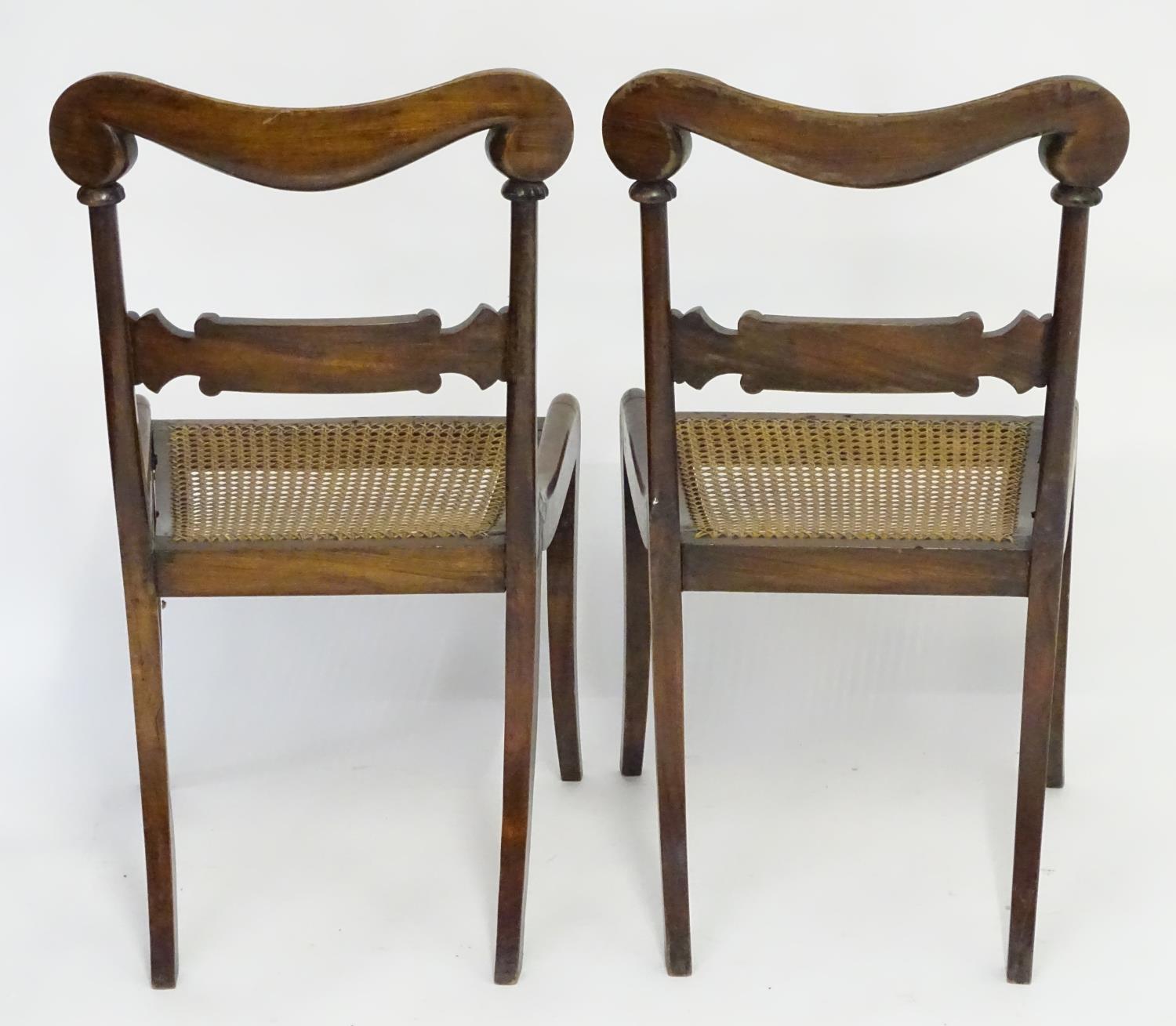 A pair of mahogany 19thC chairs with carved scrolled top rails above brass inlayed mid rails and - Image 7 of 7