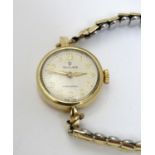 A mid 20th ladies' Rolex precision watch, with 9ct gold case, serial number 24973. 6/8" in