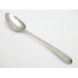 A George III Scottish silver Old English pattern teaspoon hallmarked Edinburgh 1804 maker IP. 5 3/4"