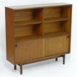 Vintage Retro, Mid-Century: a teak bookcase by Beaver & Tapley Ltd, London, labelled 'Multi-Width