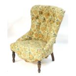 A mid / late 20thC Liberty?s chair with a shaped and deep buttoned back above a sprung seat and