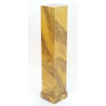 A faux marble pedestal. Measuring 9 3/4" wide x 9 3/4" deep x 46" high. Please Note - we do not make