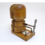 A late 19th / early 20thC milliners table hat stretcher with head circumference chart. Mechanical