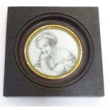 A 19thC Continental circular portrait miniature depicting a portrait of a lady wearing a draping