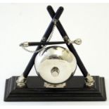 A 20thC counter bell mounted as a table gong on an ebonised base. Approx. 7" high Please Note - we