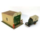 Toy: A WW2 (World War Two) era scratch built model of Art Deco garage, the tiled flat sloping roof