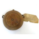 A 19thC twin handled gourd (cucurbitacin) flask with engraved floral decoration. Approx. 5" Please