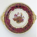 A twin handled Spode plate in the pattern Imperial. Approx. 8 1/2" diameter Please Note - we do