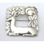 A Georg Jensen silver brooch designed by Arno Malinowski, the squared form brooch with foliate