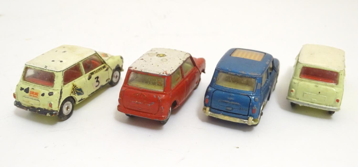 Toys: Four Corgi Toys die cast scale model cars comprising BMC Mini Cooper S with a blue body and - Image 4 of 9