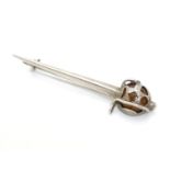 A silver brooch formed as a sword the basket hilt set with amber coloured stone. Marked Sterling