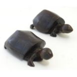 A matched pair of carved hardwood turtles with incised detail. Approx. 2 1/4" high (2) Please Note -