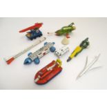 Toys: A quantity of assorted die cast dinky vehicles / rockets comprising Dinky Toys Eagle Freighter