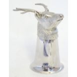 A Silver stirrup cup with stags head decoration. Hallmarked Sheffield 1998. Maker Camelot Silverware